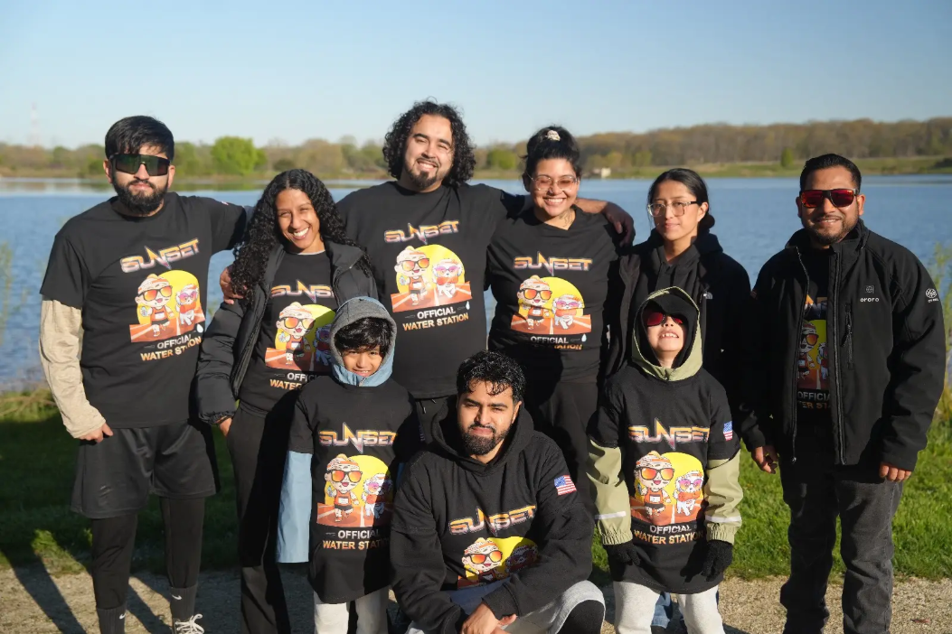 Our Team at our Water Station for runners | Sunset Tire and Auto Repair
